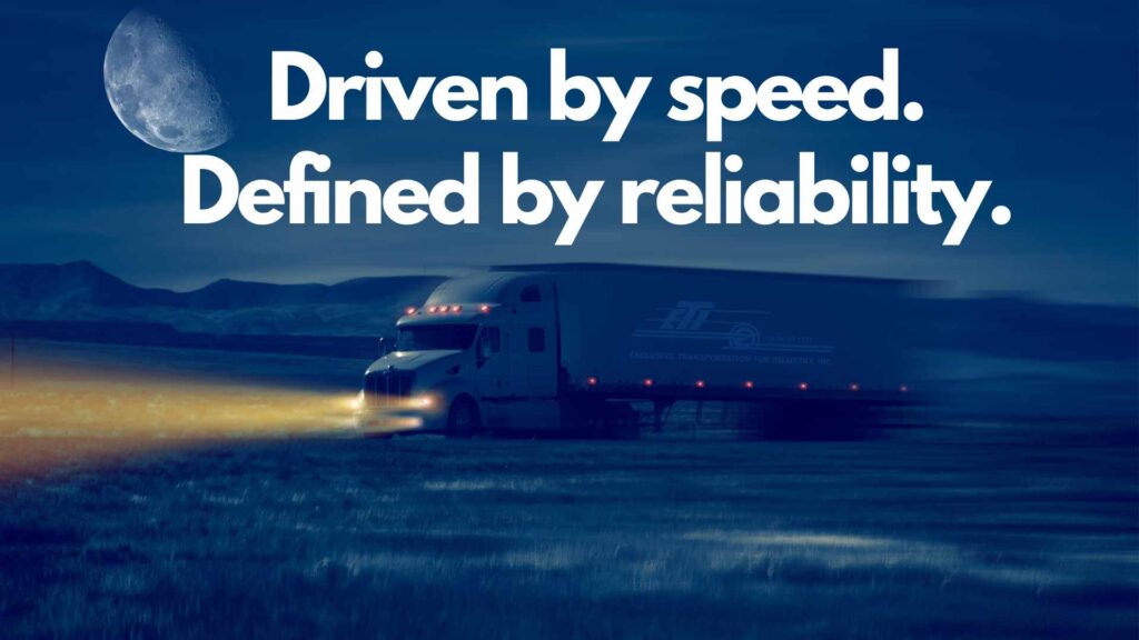 picture of a tractor trailer driving at night